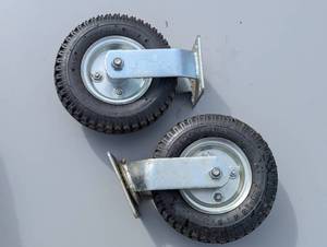 lot 16C image: Pair mixed swivel and non-swivel 2.5-4 Wheels