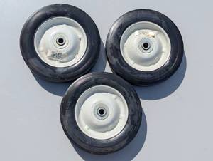 lot 55 image: Set of three hard rubber Wheels 8X 1.75