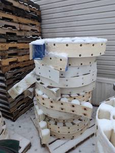 lot 100 image: Full Pallet of Large Rolls of Conveyor Belt with Poly Bins Attached.  Various Size Belts and Bins