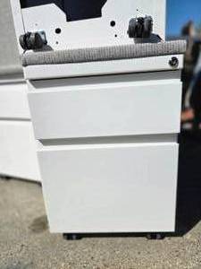lot 62 image: 10 Cushion Top Mobile File CabinetPedestals