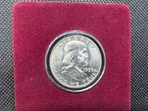 lot 54 image: 1959-D Brilliant Uncirculated Franklin Half Dollar