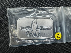 lot 70 image: 2023 BU Stacks & Bowers 1 Oz. Silver Bar
