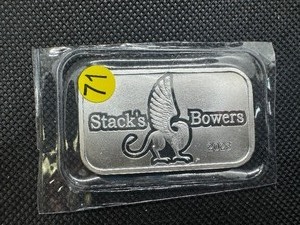 lot 71 image: 2023 BU Stacks & Bowers 1 Oz. Silver Bar