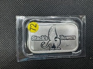lot 72 image: 2023 BU Stacks & Bowers 1 Oz. Silver Bar