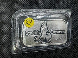 lot 73 image: 2023 BU Stacks & Bowers 1 Oz. Silver Bar