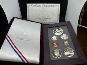 lot 76 image: 1992 U.S. Mint Olympic Silver Prestige Proof Set in Original Mint Package - PCGS Price Guide is $45.00