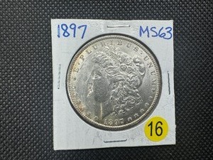 lot 16 image: 1897 Morgan Silver Dollar Marked MS63 When Purchased