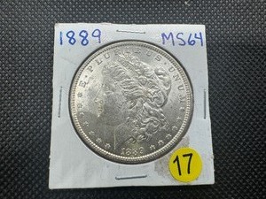 lot 17 image: 1889 Morgan Silver Dollar Marked MS64 When Purchased