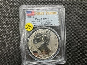 lot 25 image: 2006-P First Strike 20th Anniv.1 Oz. Silver American Eagle PCGS MS69 Reverse Proof (Only 574 graded higher) -  PCGS Price Guide $100