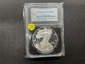 lot 28 image: 2015-W  Proof 1  Oz. Silver American Eagle NGC Ultra Cameo PF69  - NGC Price Guide $100
