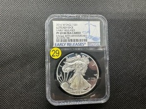 lot 29 image: 2016-W  Early Releases Proof  Lettered Edge 30th Anniv. 1 Oz. Silver American Eagle NGC Ultra Cameo PF69  - NGC Price Guide $110