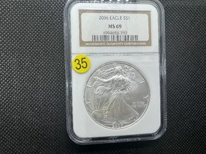 lot 35 image: 2006 1 Oz. Silver American Eagle NGC MS69 -  NGC Price Guide $65