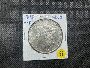 lot 6 image: 1878 7TF Morgan Silver Dollar Marked MS63 When Purchased