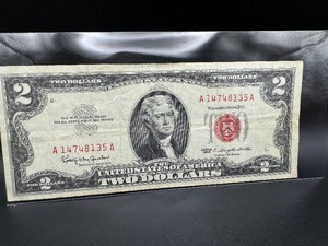 lot 100 image: 1963 Red Seal $2 Dollar Bill