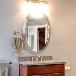 lot 28 image: Deco Mirror 23 in. W x 29 in. H Framed Oval Beveled Edge Bathroom Vanity Mirror in Brushed nickel    Customer Returns See Pictures