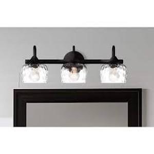 lot 34 image: Minka Lavery 23.25 in. 3-Light Matte Black Vanity Light with Clear Hammered Glass, No Bulbs Included  Customer Returns See Pictures