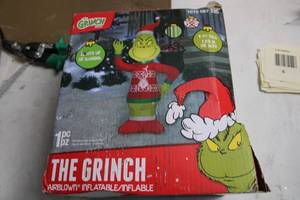 lot A-7 image: 4 Ft Grinch Airblown Inflatable Christmas Decoration
