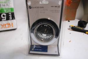 lot 23 image: Glacier Bay Cast Brass Sink Strainer