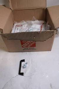 lot 27 image: Box of Black Cabinet Handles with Mounting Screws