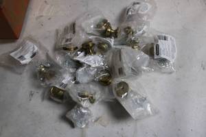 lot 112 image: Collection of New Brass Round Cabinet Knobs with Hardware