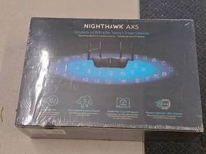 lot 488 image: Nighthawk AX5 Internet Upgrade Package (New In Box)