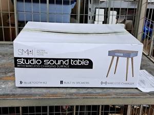 lot 529 image: Sierra Modern Home Studio Sound Table with Wireless Charging Surface, Bluetooth 4.2, Built-in Speakers (New, Unassembled)