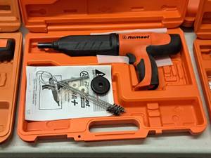 lot 406 image: Ramset Cobra Powder Actuated Fastener for Wood Framing with Operators Manual, Accessories and Plastic Carry Case
