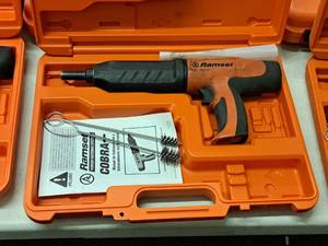 lot 407 image: Ramset Cobra Powder Actuated Fastener for Wood Framing with Operators Manual, Accessories and Plastic Carry Case