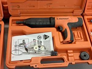 lot 411 image: Ramset Cobra Powder Actuated Fastener for Wood Framing with Operators Manual, Accessories and Plastic Carry Case