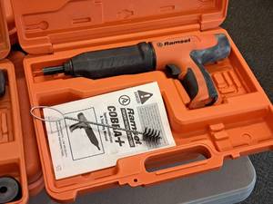 lot 412 image: Ramset Cobra Powder Actuated Fastener for Wood Framing with Operators Manual, Accessories and Plastic Carry Case
