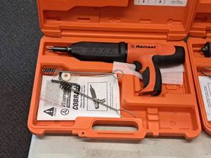 lot 413 image: Ramset Cobra Powder Actuated Fastener for Wood Framing with Operators Manual, Accessories and Plastic Carry Case