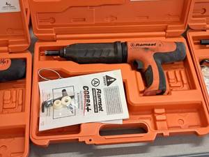 lot 423 image: Ramset Cobra Powder Actuated Fastener for Wood Framing with Operators Manual, Accessories and Plastic Carry Case