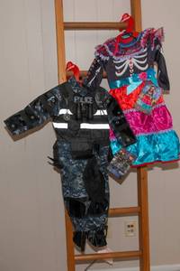 lot 44 image: Set of 2 Brand New Costumes  Size 3-4