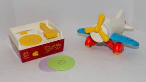 lot 63 image: 1979 Gabriel Toy Air Plane  and 2010 Replica of a Vintage Fisher Price Music Box Record Player