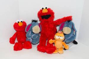 lot 72 image: Elmo, Eeyore and Garfield Stuffed Toys