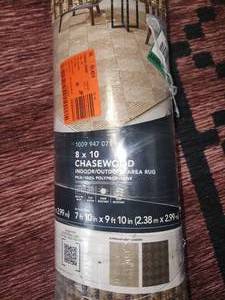 lot 10 image: 8x10 chasewood indoor outdoor area rug