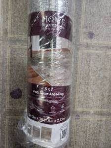 lot 14 image: 5x7 fog sage machine washable area rug