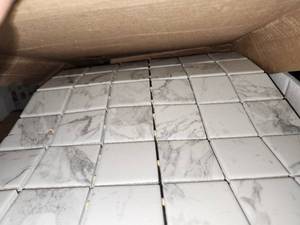 lot 35 image: 4 boxes Arabescato marble porcelain mosiacs