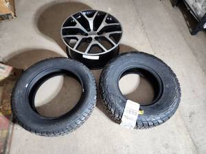 lot 41 image: Misc. Tires and a rim