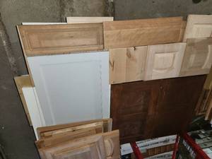 lot 49 image: 200 cabinet doors and shelves