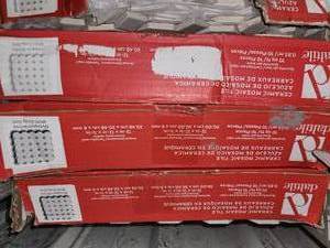 lot 69 image: 7 boxes octagon white grey mosiacs