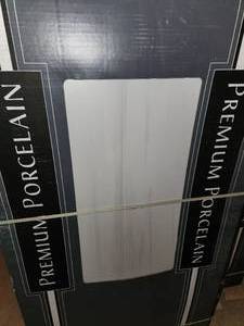 lot 86 image: 4 boxes 2448 porcelain tile
