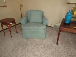 lot 7 image: Occasional green club style chair