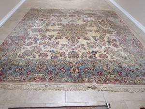 lot 67 image: Large square wool oriental design throw rug  132 x 119