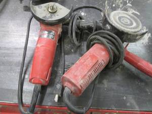 lot 77 image: Pair of Milwaukee angle grinders...