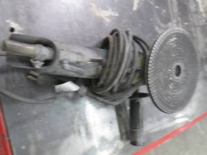 lot 79 image: Makita angle grinder...