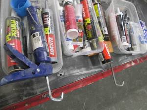 lot 106 image: Lot of assorted caulking and adhesi...