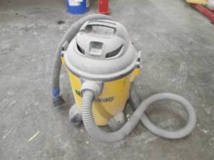 lot 117 image: Portable Shop-vac with hose and bru...