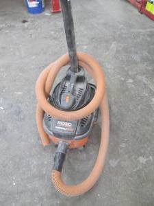 lot 120 image: Ridgid 4-gallon portable van with h...