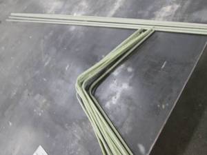 lot 133 image: Bundle of fiberglass rebar, 10ft straight pieces plus...